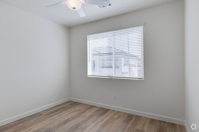 3BR, 2BA - 1,572SF - Bedroom - Woodcrest at Power Ranch Apartments