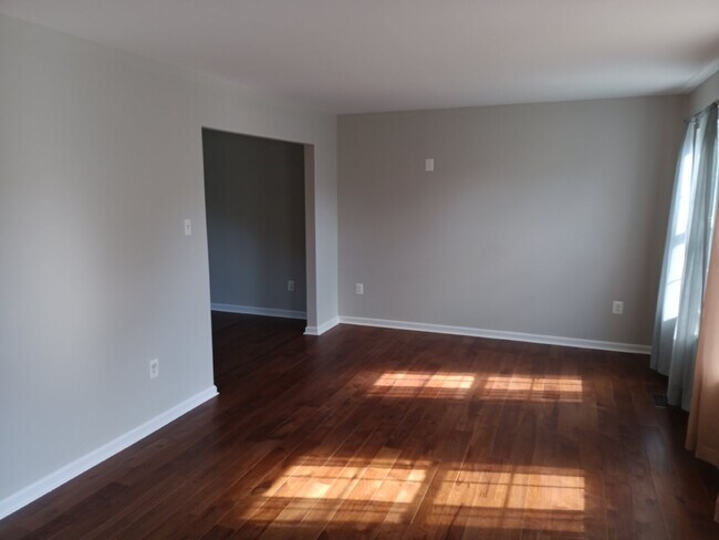 Photo - This charming 1,732-square-foot single-family home offers 3 bedrooms and 3 bathrooms, featuring a...
