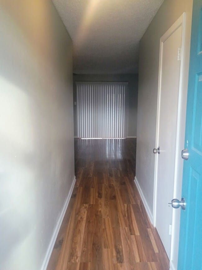 Photo - Updated 3/2 Home with 2-Car Garage + Air-Conditioned Workshop!