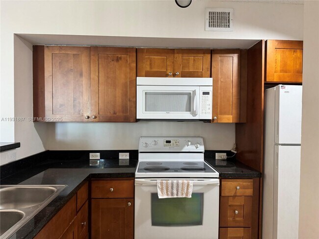 Building Photo - 11145 SW 6th St Unit 104