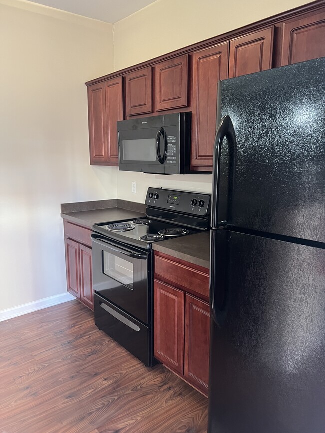 Kitchen with microwave and dishwasher - 532 N Morton St Unit Morton Mansion Apt 203