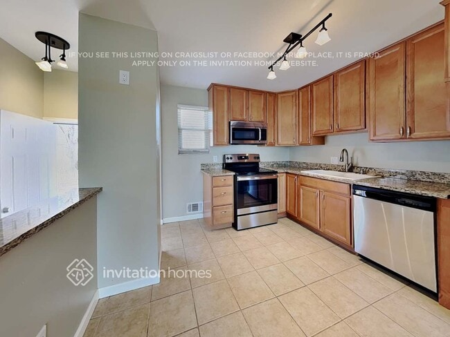 Photo - 1909 E 116th Ave