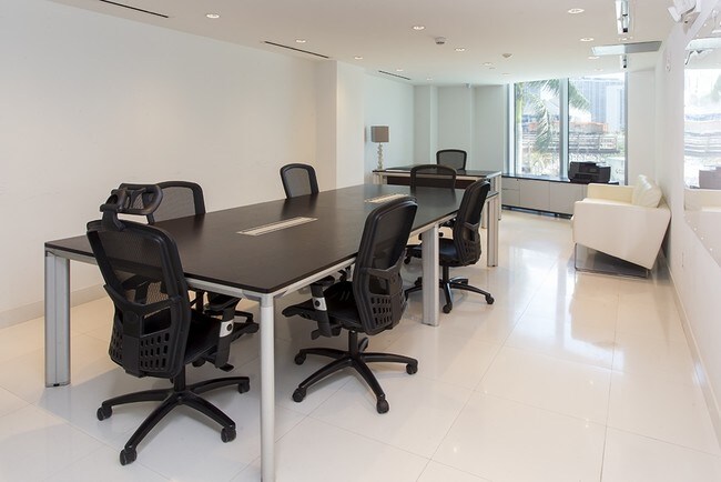 Larger Private Office with Conference Desk - 900-990 Biscayne Blvd