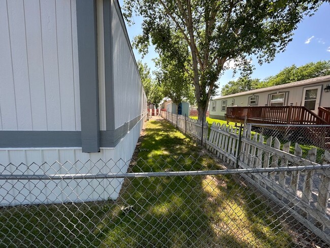Photo - 3 Bed 2 Bath Mobile Home with Fenced Yard and Storage Shed