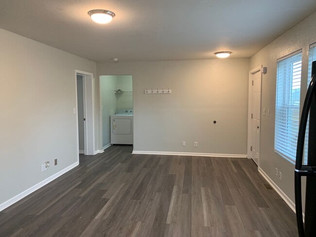 Photo - Super cute and updated with fresh paint, new floors, some fixtures, and all appliances.