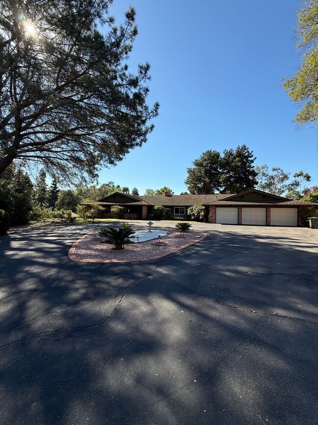Photo - Ranch Style Home on Large Lot with Circular Driveway