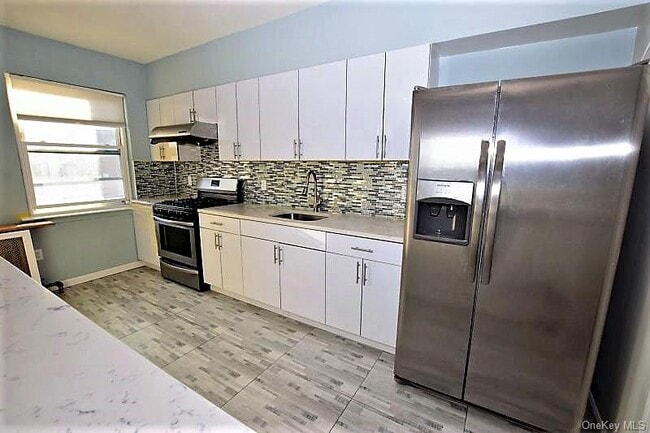 Building Photo - 42-10 50th Ave Unit 2f