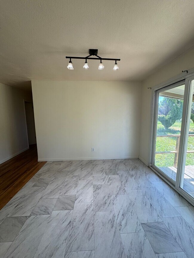 Photo - 3 bed 1 bath with large back yard - ONE SMALL PET CONSIDERED!