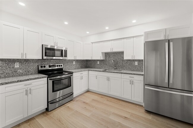 Photo - 35 NW 49th Ave Unit Rear