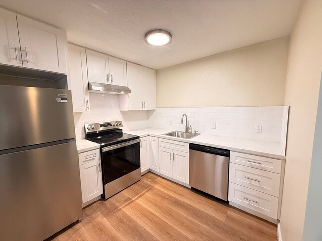 Building Photo - 6401 Montecito Blvd Unit 14