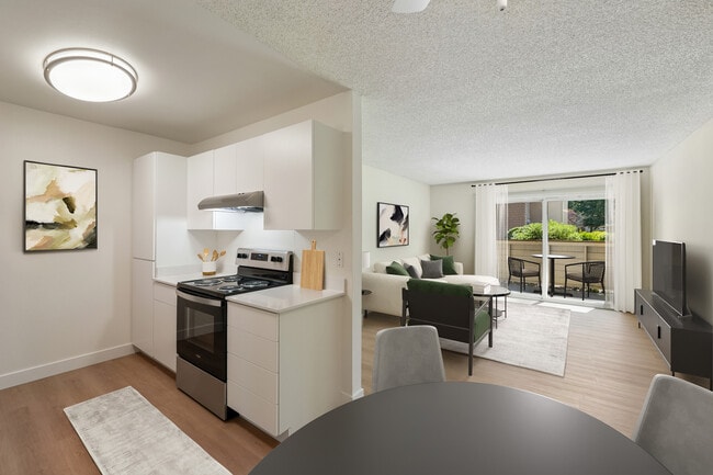 Renovated Package II kitchen, dining, and living room with hard surface flooring - eaves Foster City