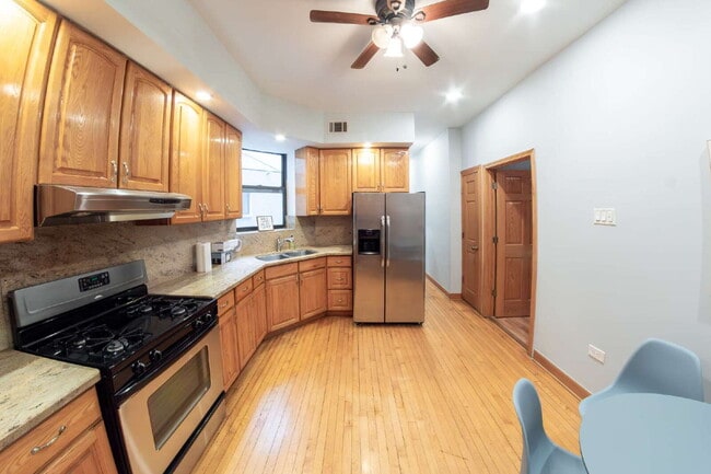Photo - FURNISHED 3-Bedroom Apartment in Vibrant Chicago Neighborhood! Unit 2