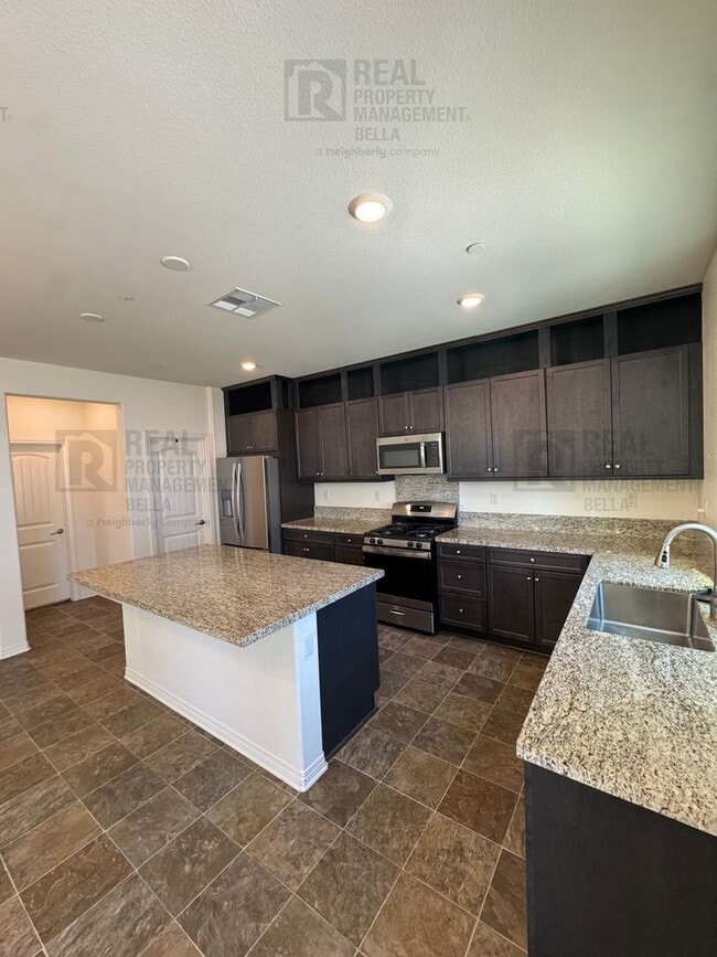 Photo - Spacious Menifee Home with Open Floor Plan, Walk-In Closets & Covered Patio