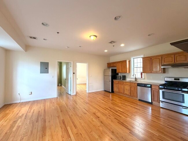 Building Photo - 687 Avenue A Unit #201