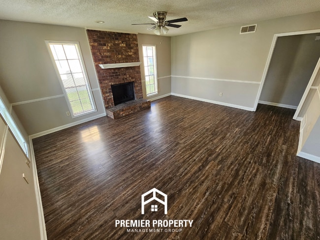 Photo - Charming 3BR/2BA Kirby Mills Cove | Hardwood Floors, Rustic Brick Fireplace & Garage