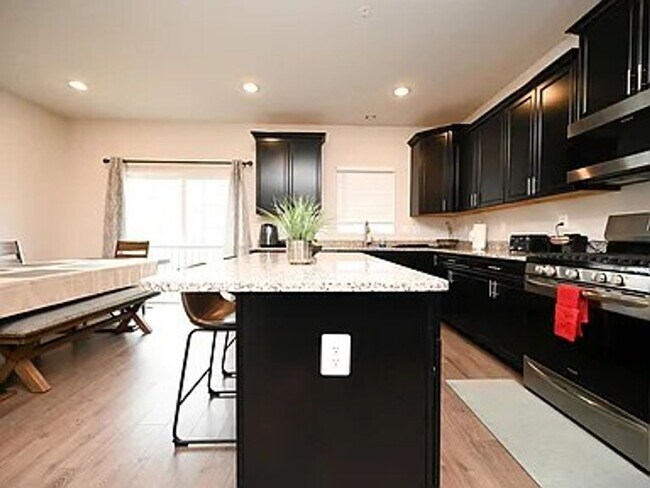Photo - Stunning 3-Story Brick-Front Townhome | Modern Living + Military & First Responder Discount