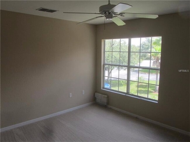 Photo - Water view condo with garage in sought after westchase