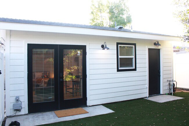 French door entrance to unit. Other door leads to a storage unit. - 2147 S Orange Dr