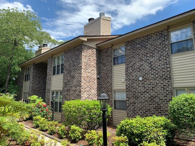 Building Photo - Walk to the Beach! Available Now! Unfurnished Two-Bedoom, First Floor Condo East of 17 in MB!