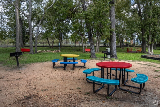 Wooded Park with Picnic Tables