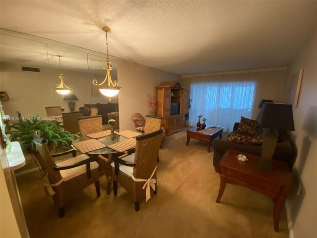 Building Photo - 8135 Sunrise Lakes Blvd Unit 308