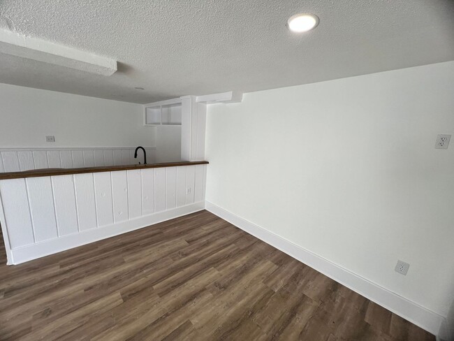 Photo - Cozy 1-Bedroom Triplex Unit with New Appliances