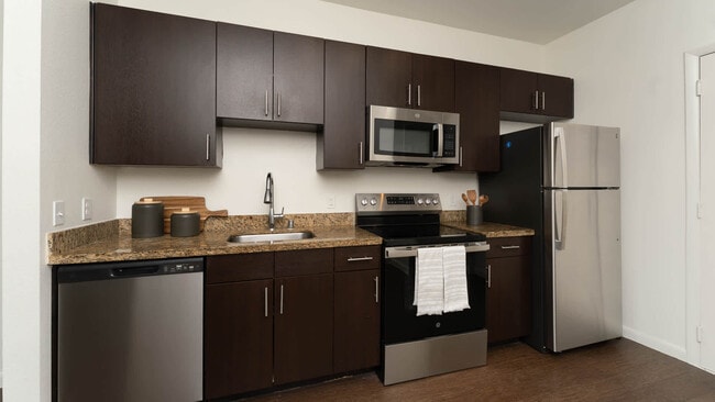 Kitchen with Stainless Steel Appliances - Union at Carrollton Square