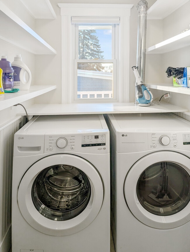 Kitchen pantry/laundry room with in-unit washer and dryer - 22 Reed St Unit 2
