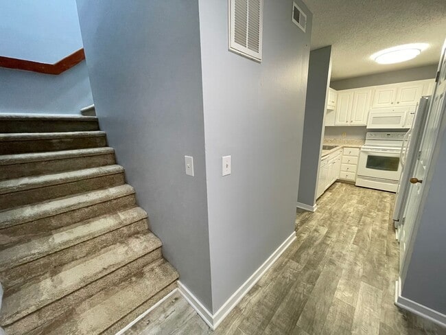 Photo - Updated, spacious 4br 2ba condo within wal... Unit G8