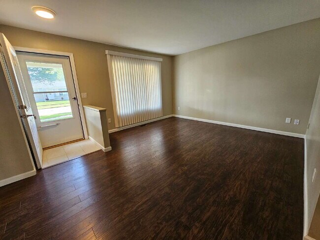 Photo - Clean 3-Bedroom Tri-Level, 1.5 Bath with Updated Kitchen, Great Room, Fireplace & Private Backyar...