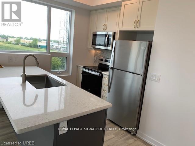 Photo - 5055 Greenlane Unit 406