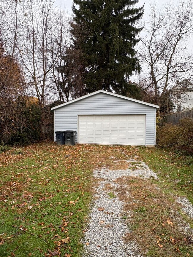Photo - Spacious 4-Bedroom Akron Home with Garage | Open House Feb 5