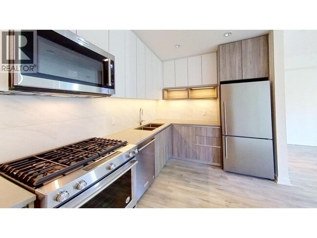 Photo - 8940 University Crescent Unité 4XX