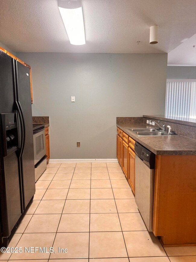 Photo - 6984 Ortega Woods Dr Unit 8-11