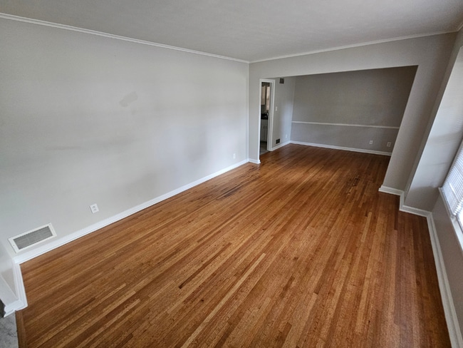 Photo - Massive 4BR/3BA Memphis Rental | Brick Fireplace & Built-Ins | Fenced Yard!