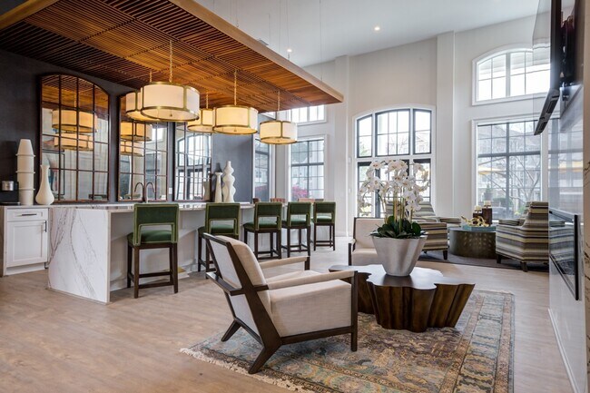 View-At-Legacy-Oaks-Apartment-Homes-in-Knightdale-NC-Renovated-Clubhouse-Kitchen-and-Lounge-Area