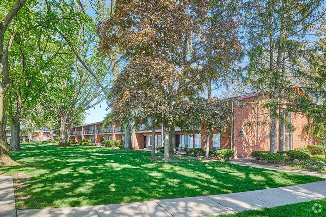 Green space in front of Garden Arms Apartment building
