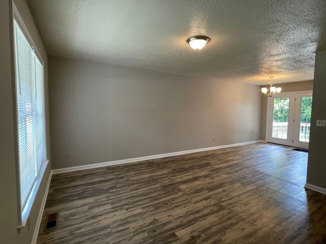 Photo - SW Updated Home - Wood Laminate Flooring, Front Porch & Deck!