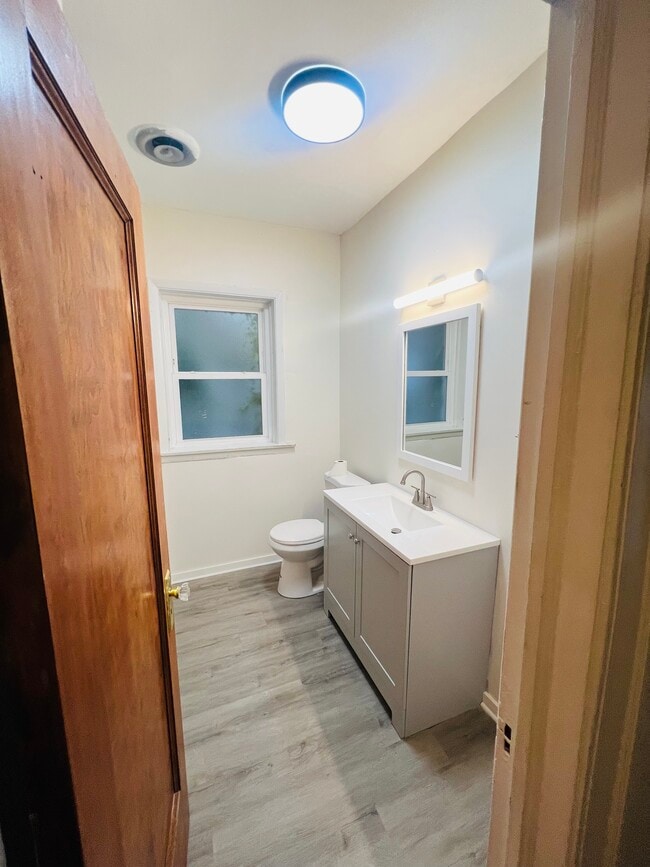 Bathroom on main level of apartment - 6937 S Merrill Ave Unit Floor 1