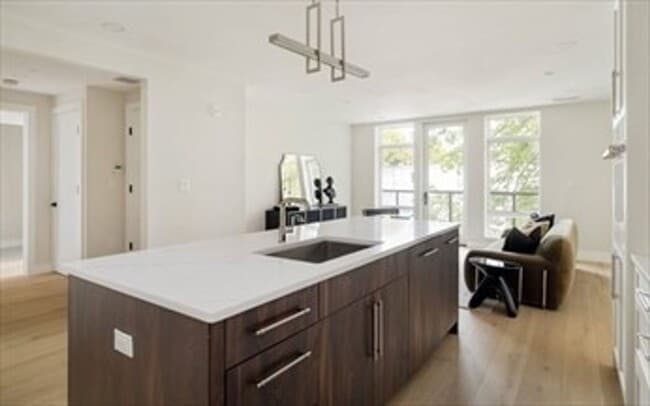 Photo - 1 Bed • 1.5 Bath • Garage Parking • New Luxury Building – Available Now, December, or January