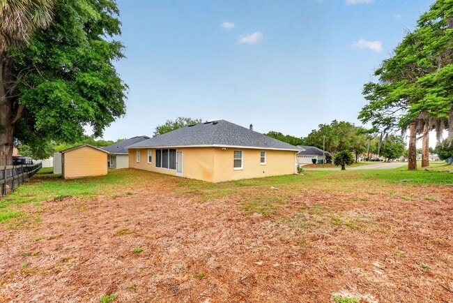Photo - Available Now! Move-In Ready 3BR Home with Florida Room & Shed