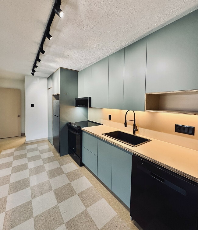 New! 2BD, 1BA - 800SF Premium Plus-Available 4/6! Modern kitchen with sleek cabinets, stylish lighting, and new modern flooring.