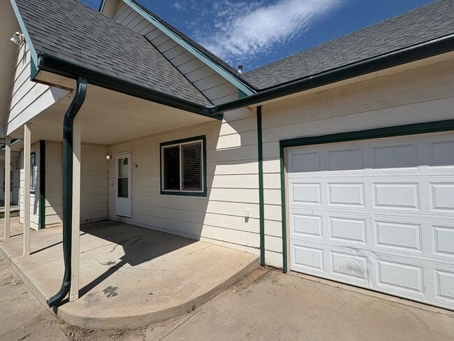 Photo - Fully Renovated 3 Bed 2.5 Bath Townhome w/ 1 Car Garage & Yard!