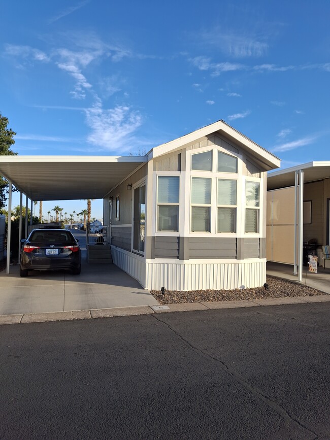 Home front and carport - 306 S Recker Rd Apartment Unit 1 Parkhaven