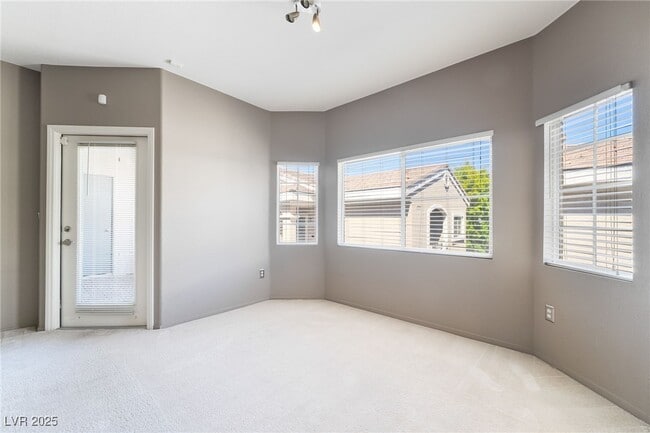 Building Photo - 9330 W Maule Ave Unit 231
