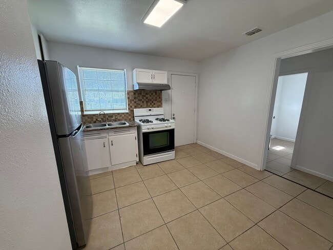 Photo - Charming 3BR Home w/ Hardwood Floors & Private Yard – Great SA Location