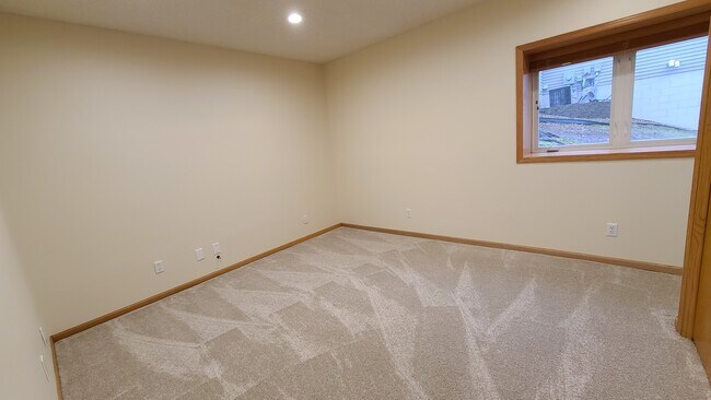 basement bedroom 1 of 2 - 1480 Violet Ln