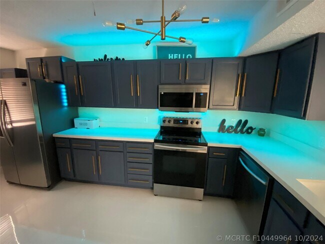 Photo - 8891 Wiles Rd Unit 208