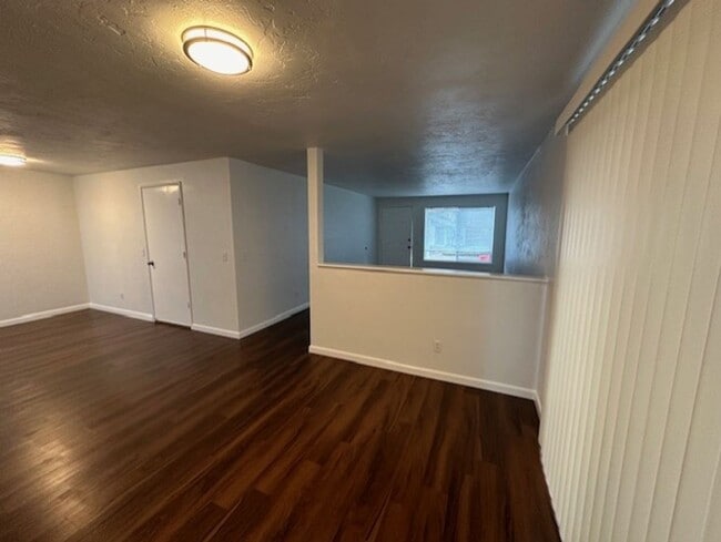 Photo - Remodeled Unit Of A Duplex with Central AC & Fenced Back Yard / Will Consider A Small Pet