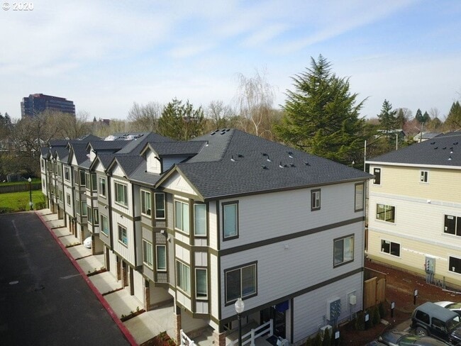 Photo - Modern 3-Bedroom Townhome-Style Home with Attached Garage, Private Patio & En-Suite Bathrooms in ...